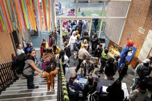 Wake Forest students host local elementary school students for trick-or-treating during the annual Project Pumpkin service project, held this year in the Sutton Center gymnasium on Wednesday, October 30, 2019.