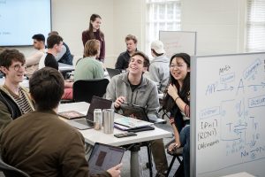 Students in Computer Science 112 with professor Sarra Alqahtani work in small groups to write code in the C++ programming language, in Manchester Hall on Thursday, March 5, 2020.