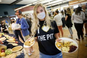 student wearing an "I [heart] The Pit" tshirt