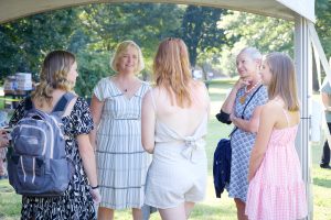 Wake Forest University holds a picnic for the Class of ’24, part of the Sophomore Year Experience initiative, on Davis Field on Monday, August 23, 2021. President Susan R. Wente mingles with the students.