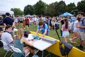 Wake Forest students attend the Student Involvement Fair on Poteat Field to meet representatives from student organizations, clubs, religious and athletic groups, volunteer services and more, to learn about opportunities for fun and fulfillment, on the campus of Wake Forest University, Tuesday, August 31, 2021.