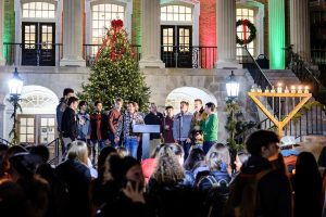 Wake Forest celebrates the Lighting of the Quad for the holiday season, on Hearn Plaza on Tuesday, November 30, 2021. A Cappella group Chi Rho performs.