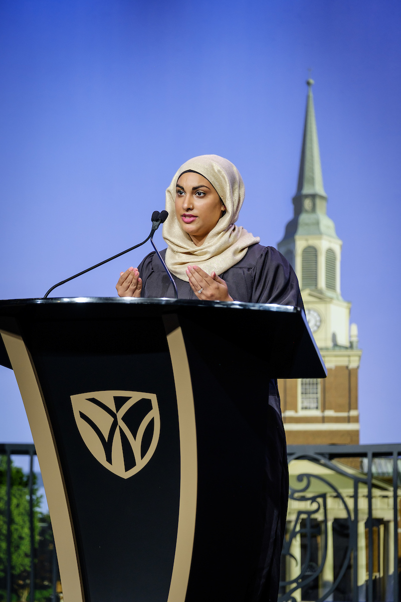 Wake Forest University holds the second of four 2021 Commencement Diploma Ceremonies, for Bachelor of Science, in Joel Coliseum on Sunday, May 16, 2021.   Associate Chaplain Naijla Faizi gives the invocation.