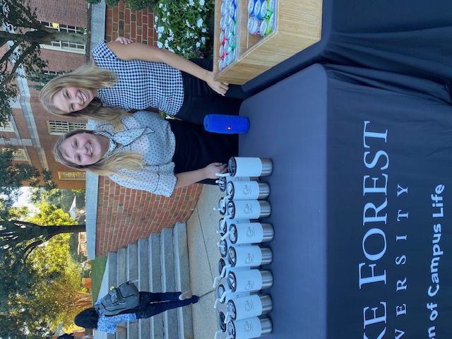 Campus Life team members pose with swag