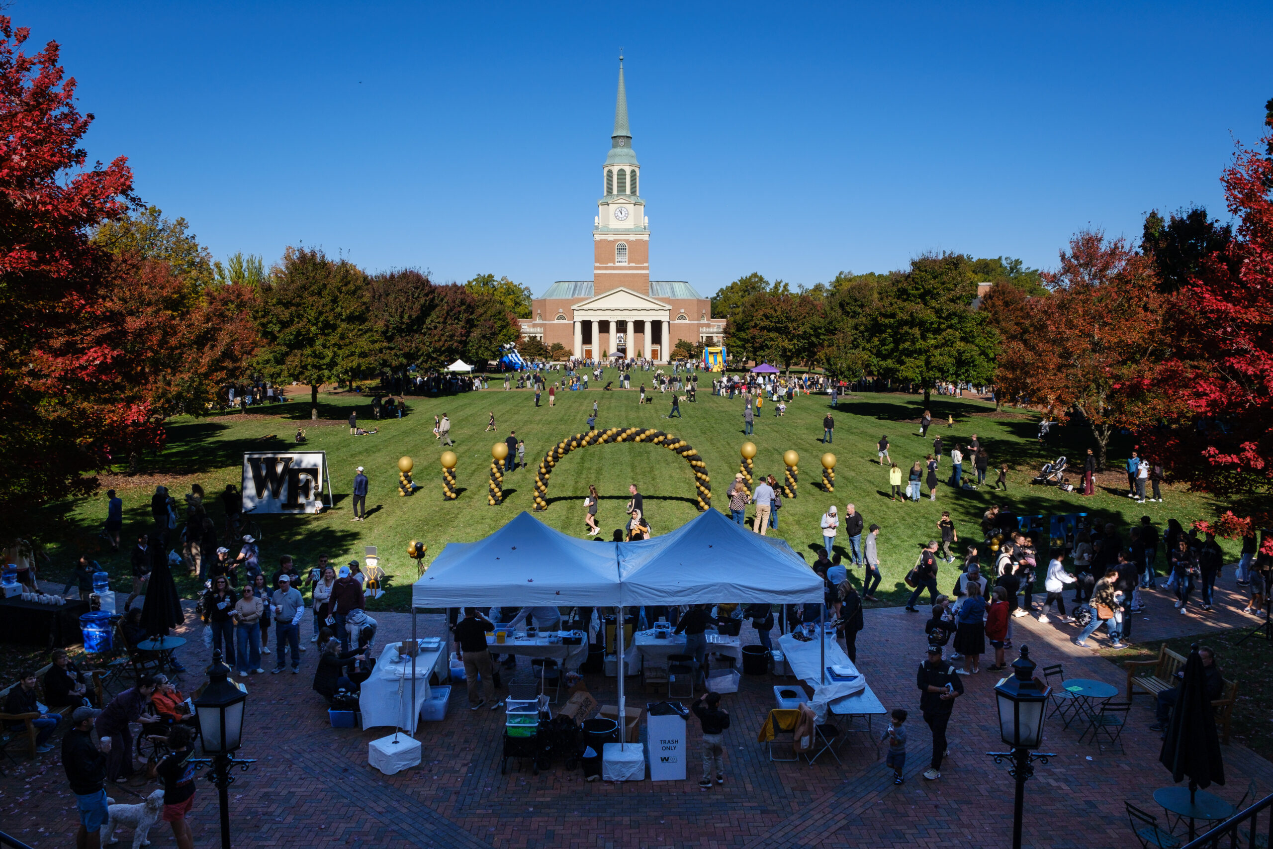 Wake Forest alumni attend the Festival on the Quad during Homecoming 2023, on Hearn Plaza on Saturday, October 21, 2023.
