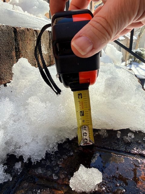 3+ inches of packed down snow with a compressed layer of sleet on top. not fun