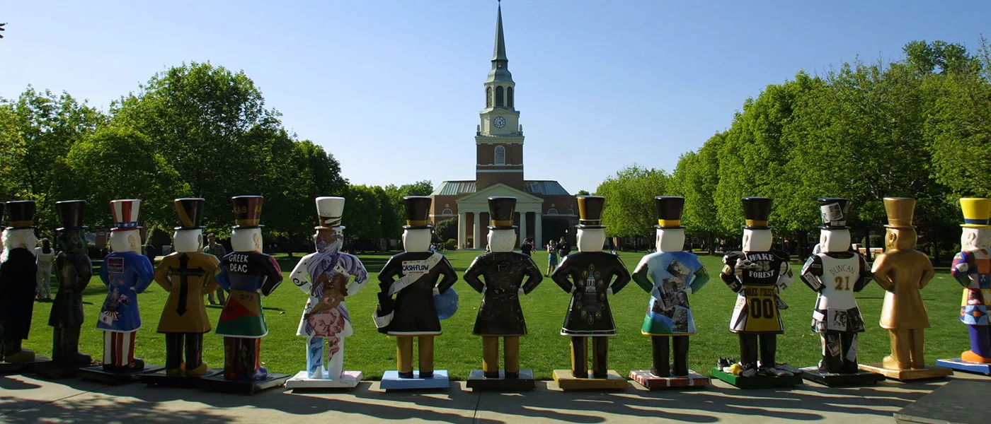 The backsides of the Deacons on Parade - with Wait Chapel in the distance
