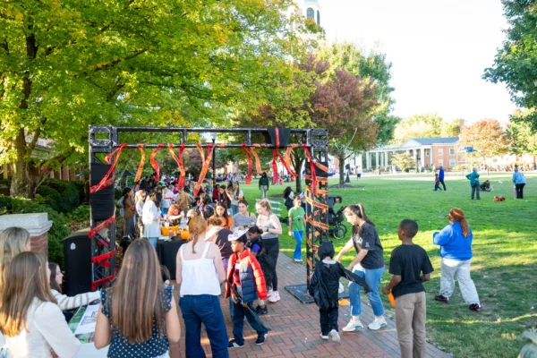 Wake Forest University students participate in the 39th annual Project Pumpkin, a volunteer service Halloween event for local school children, on Hearn Plaza on Tuesday, October 27, 2026.