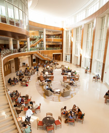 Business students enjoy the atrium in the new Farrell Hall, home of the Wake Forest Schools of Business.