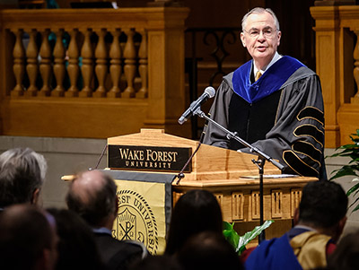 President Hatch speaks at lectern