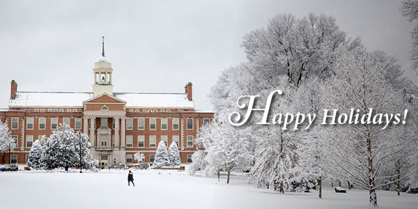 Happy Holidays with snowy campus in background