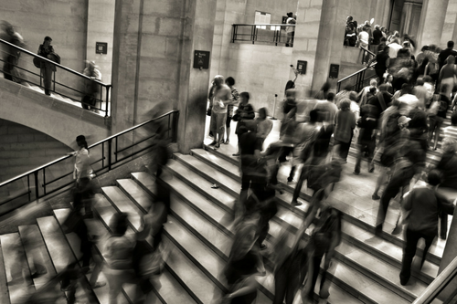 Staircase full of running people