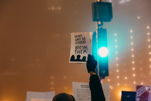 Person holding sign