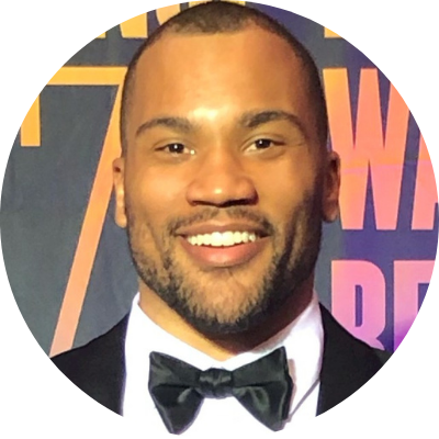 Headshot of Brandon Chubb, He is wearing a tux, and smiling