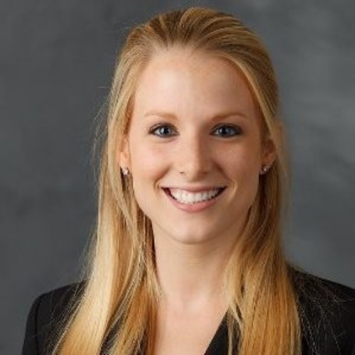 Headshot of Caroline Weaver, she has blonde hair and a big smile