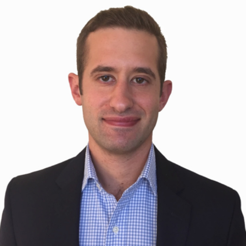 Headshot of John Borkowski, he is wearing a blue shirt and suit jacket