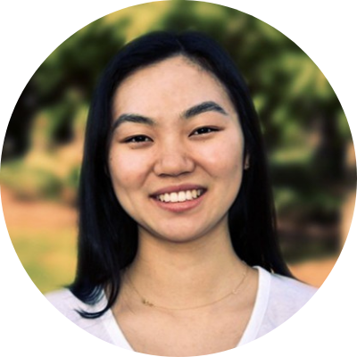 Headshot of Caroline Li, she has dark hair and is wearing a white shirt and a smile