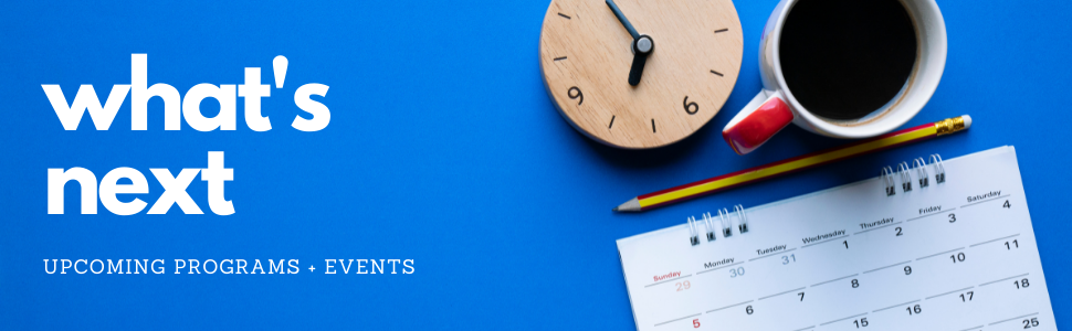 Blue background with a paper calendar, pencil, coffee, and wooden clock