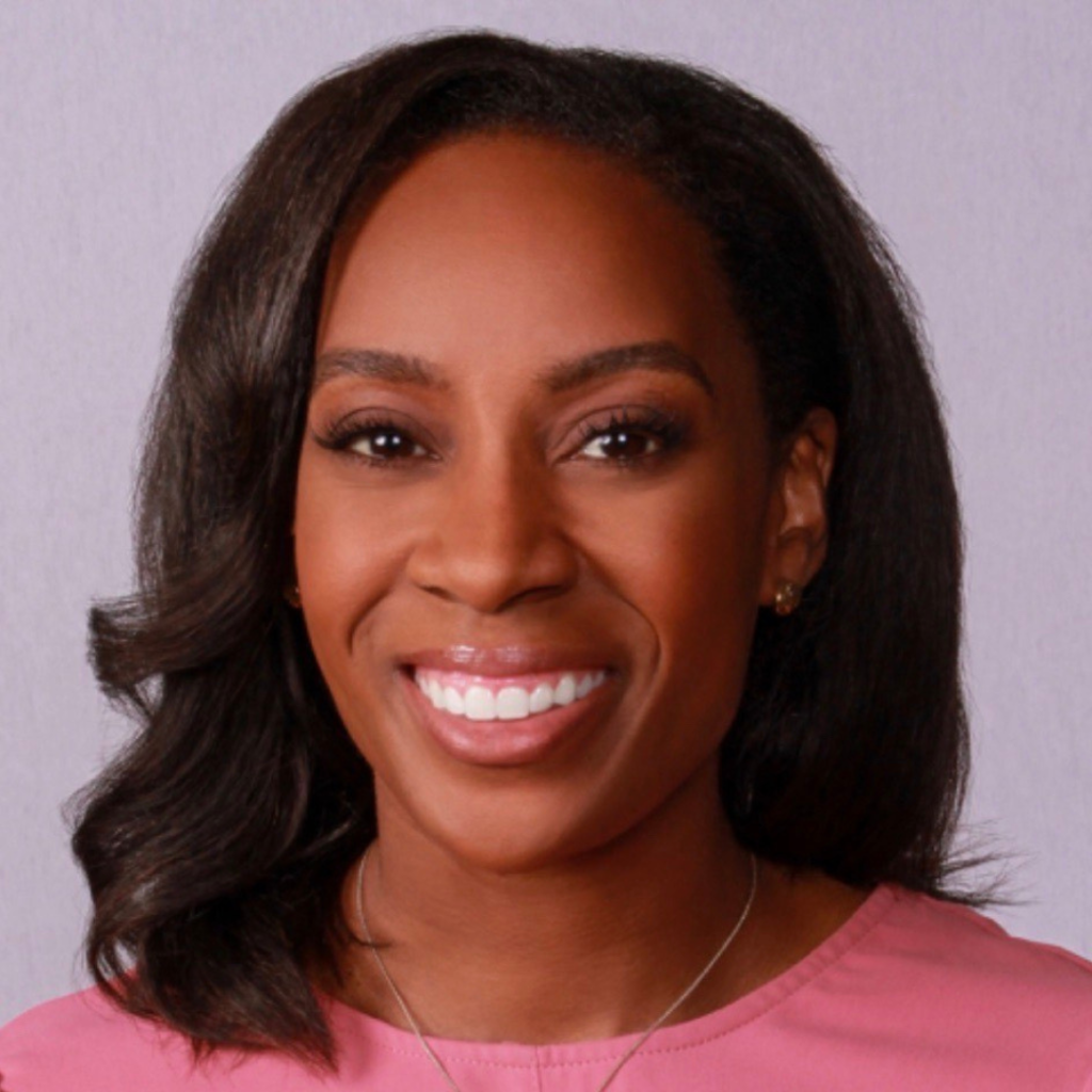 Headshot of Cassaundra Young ('07); she is wearing a pink shirt