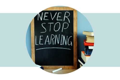 Chalkboard with the words Never Stop Learning written on it