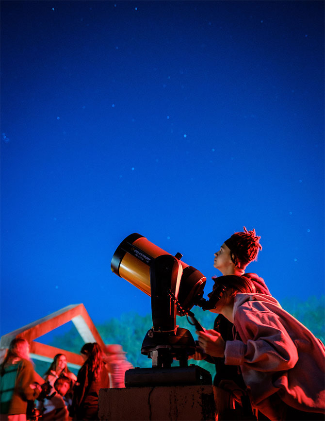 Wake Forest students learn to calculate the diameter of celestial objects using a telescope and basic trigonometry, in their astronomy class in Olin Hall