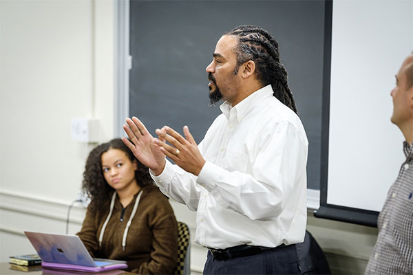 Wake Forest students in the First Year Experience class have a wide ranging discussion of the liberal arts, AP class credit, divisional requirements, and required language classes with professors Nate French and Chris McLaughlin.