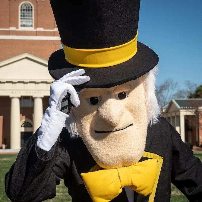 The Demon Deacon in front of Wait Chapel
