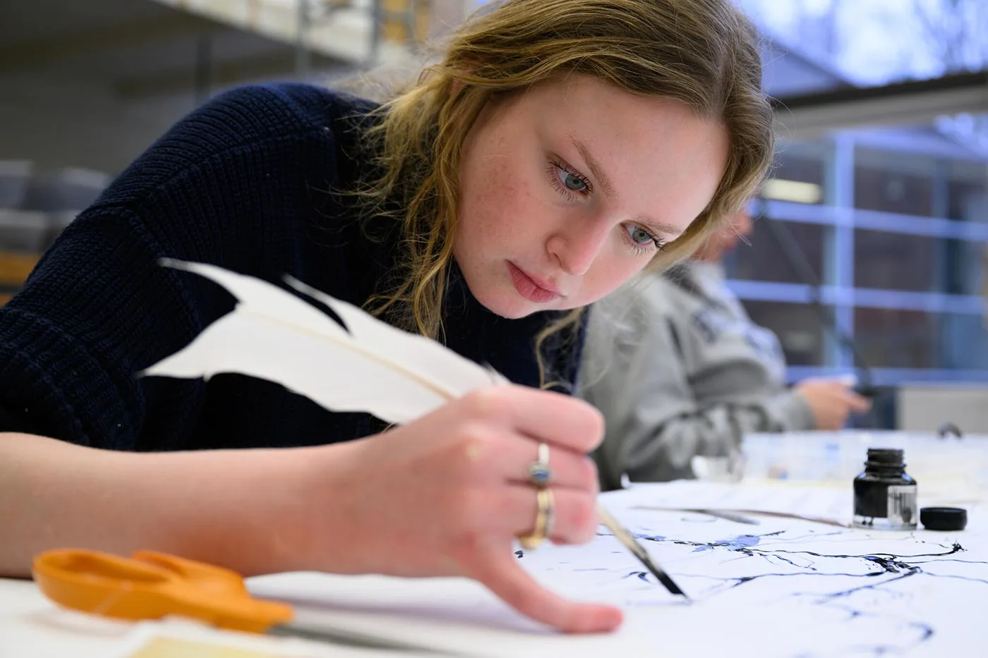 Wake Forest University students from an art history and a studio art class taught by Prof. John Pickel and Prof. Merih Danali create quill pens from turkey feathers.