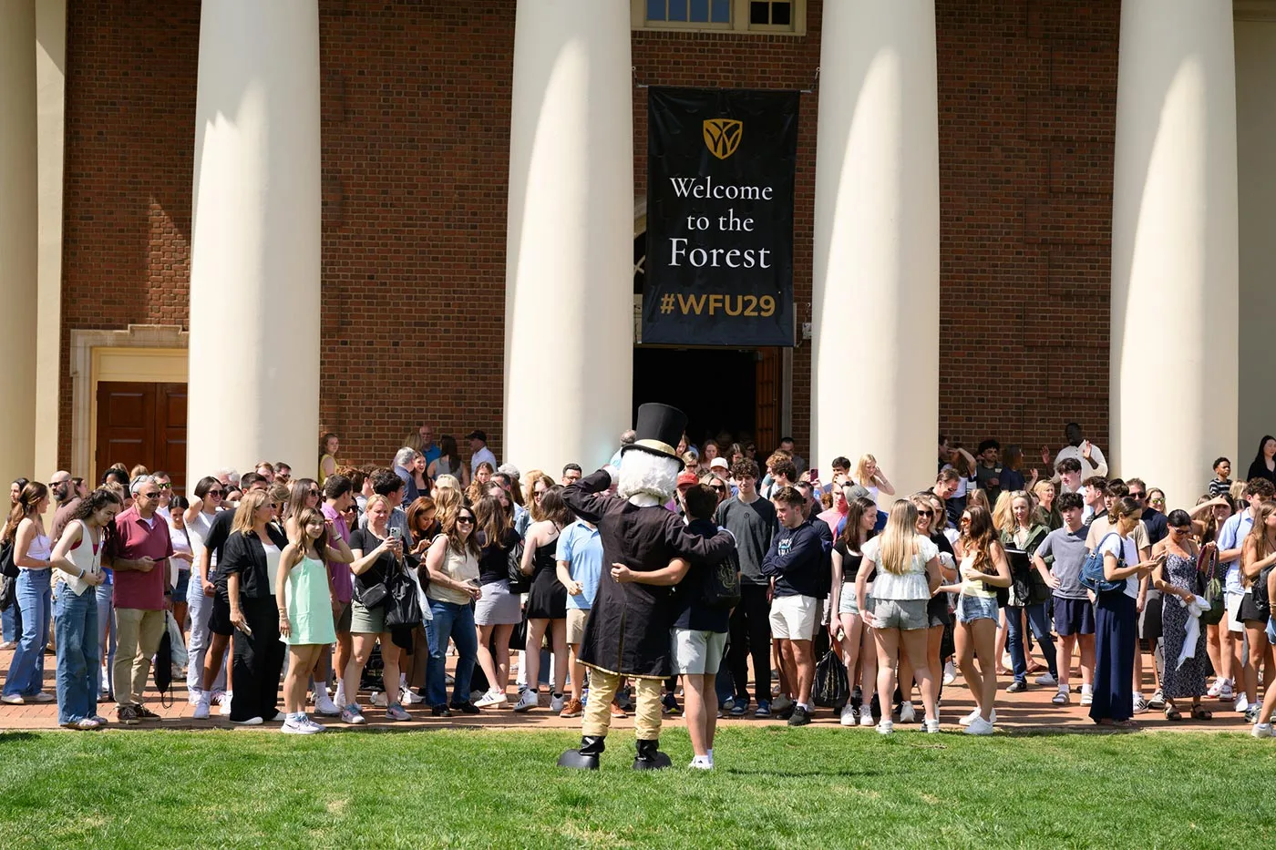 The Deacon poses for photos while welcoming the newest class of Demon Deacons.