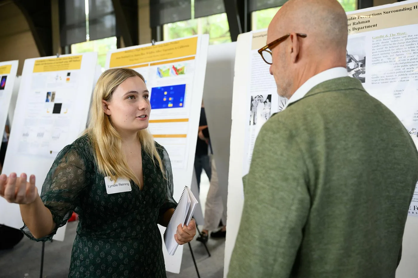 Wake Forest University undergraduate students use posters to present the findings of their research and scholar work at URECA Day.