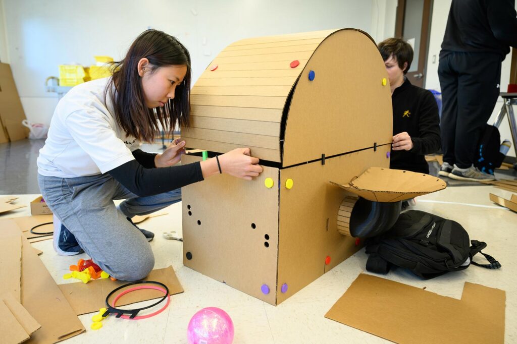 Wake Forest University students in Engineering Prof. Tricia Clayton’s ENG 111 put together and display their cardboard creations fit to the theme of ‘recreational items’ for the Cardboard Showcase.