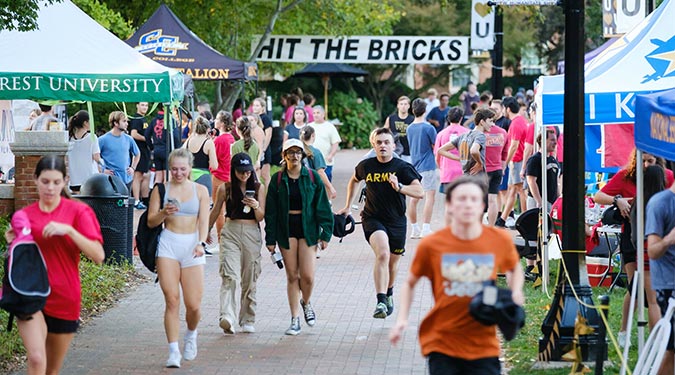 Members of the Wake Forest community run and walk laps around Hearn Plaza to raise money for cancer research during the annual Hit the Bricks for Brian fundraiser.