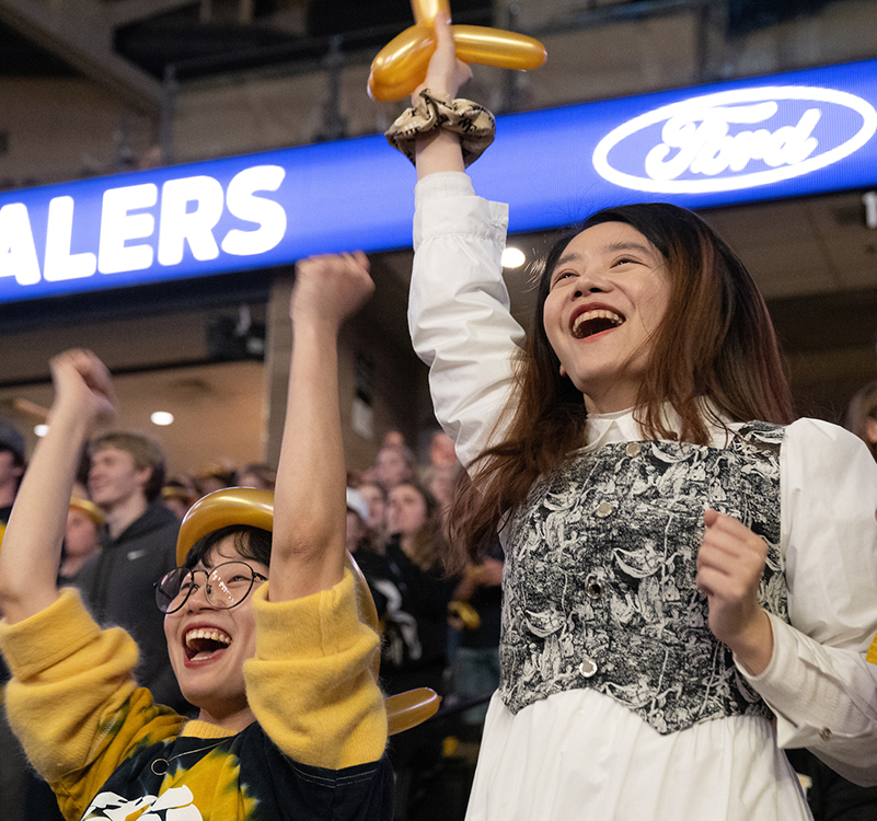 Students cheer at a WFU athletics event