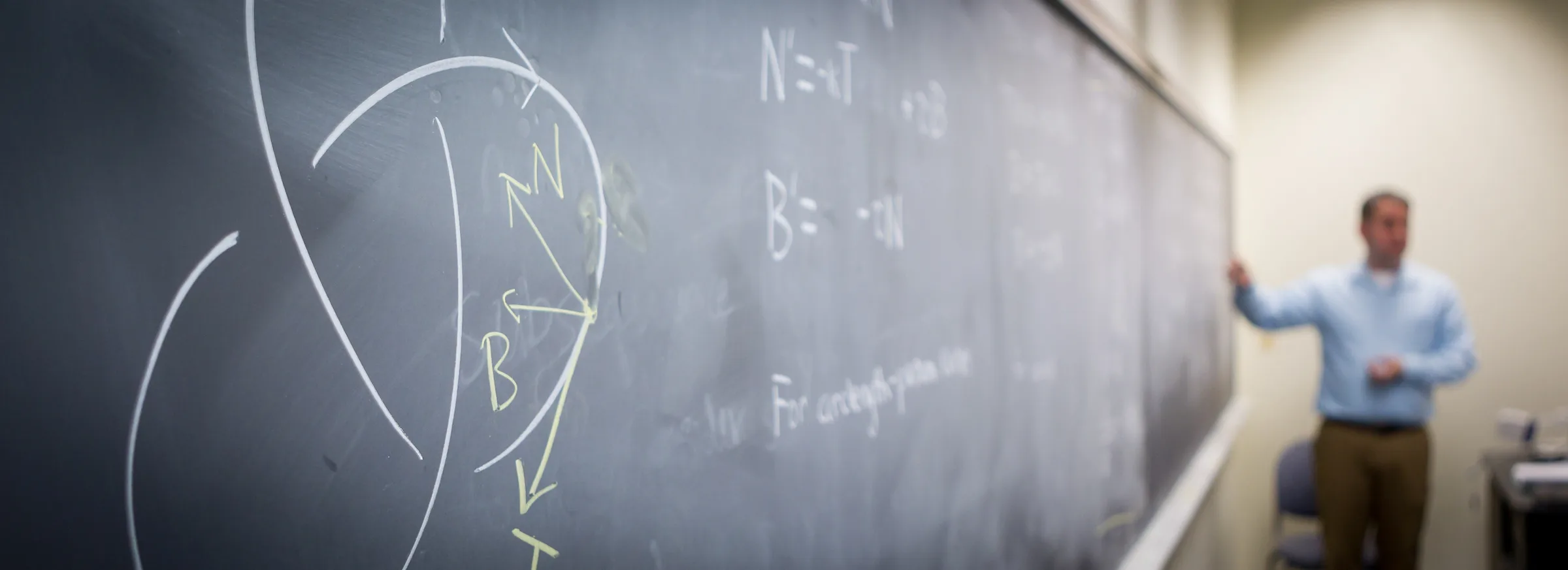 Wake Forest mathematics professor teaches his differential geometry class in Manchester Hall.
