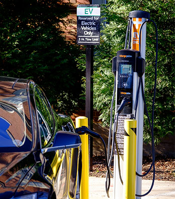 An electric vehicle charging station has been installed on the Wake Forest campus near Tribble Hall