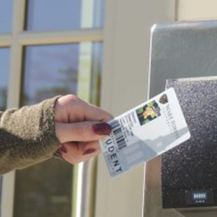 student uses onecard to get into campus building