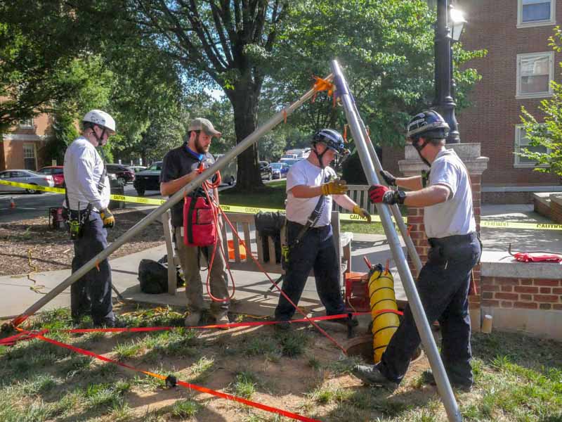 rescue team sets up ropes for confined spaces training