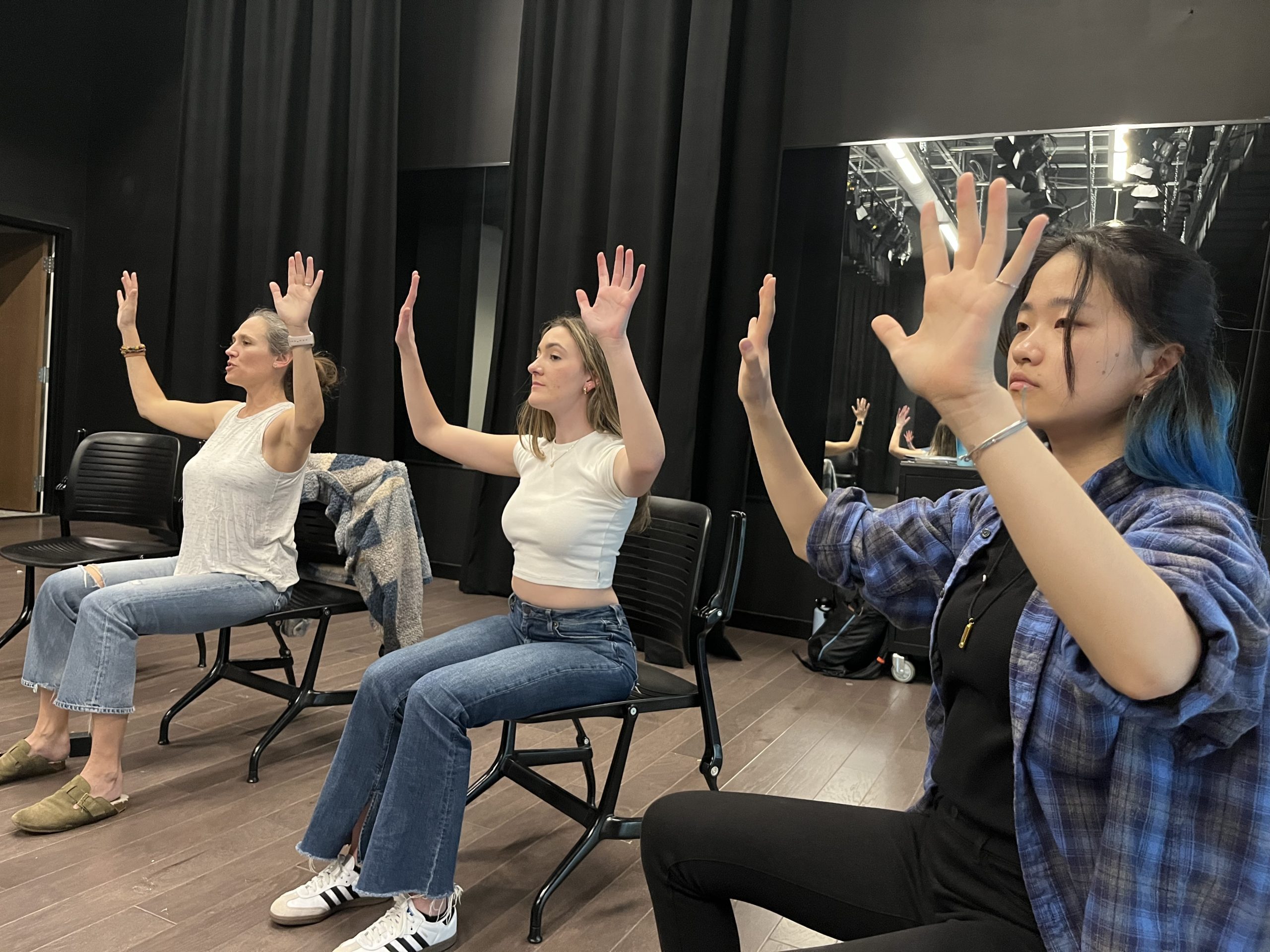Christina Soriano, Morgan Grygiel (‘26), Ziqi “Nancy” Huang (‘27)
lead an exercise during an IMPROVment class at the Intergenerational Center