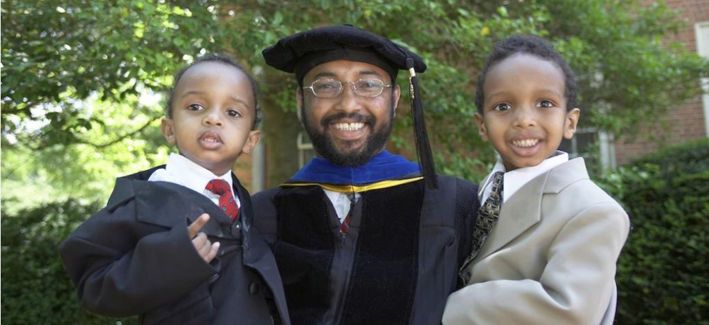 abraham at graduation with children