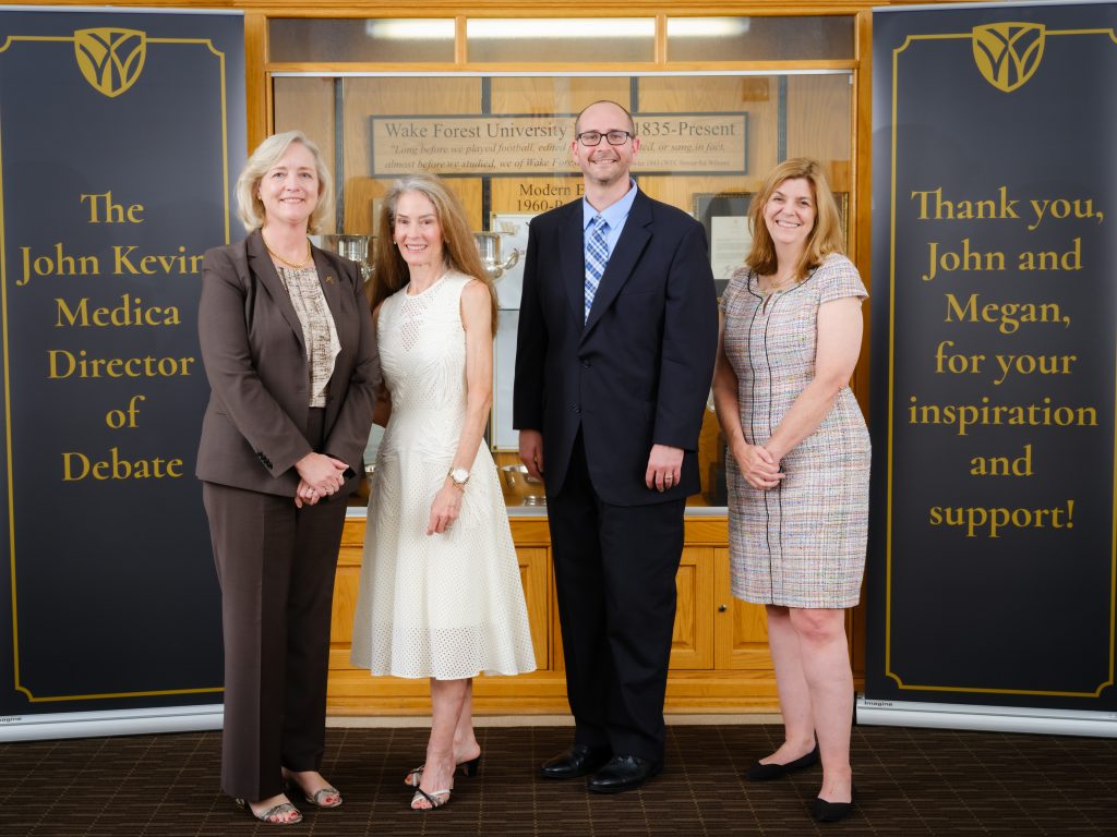 A group photo of President Susan R. Wente, Megan Medica, Jarrod Atchison, and Michele Gillespie.