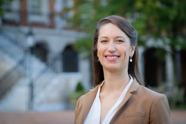 Jackie Sheridan stands in front of Reynolda Hall