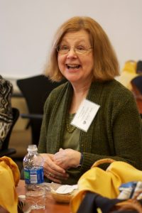 Classical languages professor Mary Pendergraft talks at a roundtable.