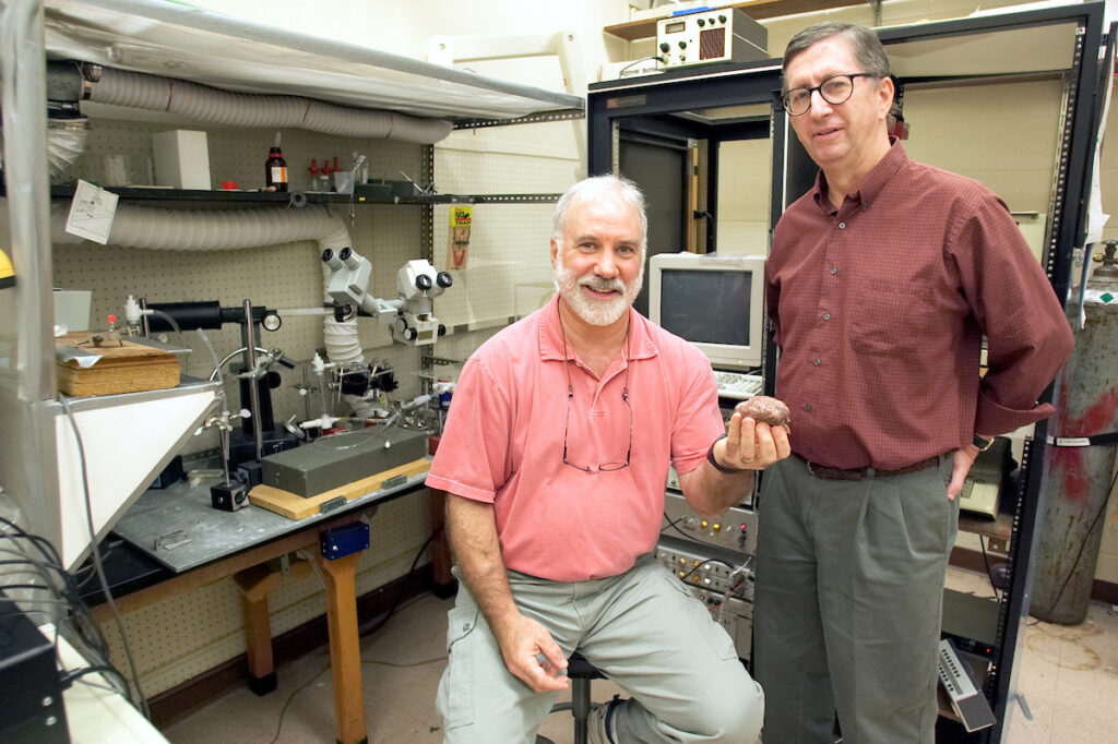 WFU biology professor Dr. Wayne Silver (holding sheep's brain) and philosophy professor Dr. George Graham are working on the curriculum for a neuroscience minor.