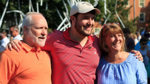 A family poses during Making of a Demon Deacon event at WFU