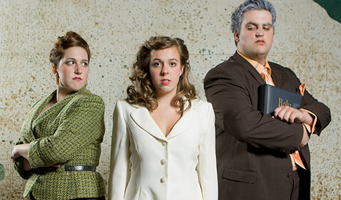 Seniors Claire Vasile as Mrs. Celia Peachum (far left) and Tony DeMartino as Jonathan Jeremiah Peachum. Freshman Candice Dickinson plays their daughter, Polly, in 