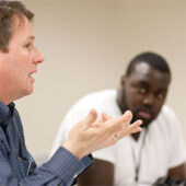 Computer science professor Brian Kell leads a discussion on digital technology in his seminar class.