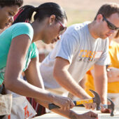 Law students volunteered at a Habitat for Humanity building site in downtown Winston-Salem on Wednesday as part of the law school’s orientation for new students.