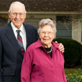 Henry and Elizabeth Stroupe in front of their Faculty Drive home in 2006.