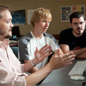 Computer science professor Errin Fulp works with graduate students Brian Williams (center) and Wes Featherstun (far right), who worked this summer at Pacific Northwest National Laboratory developing a new type of computer network security software modeled after ants.