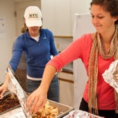 As part of Campus Kitchen's Turkeypalooza, student volunteers deliver dinner to and spend time with young people at The Children's Home in Winston-Salem.